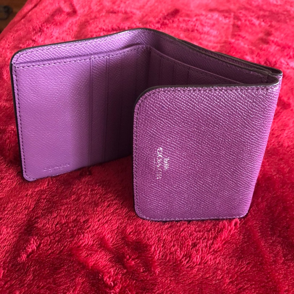 Purple Coach trifold wallet